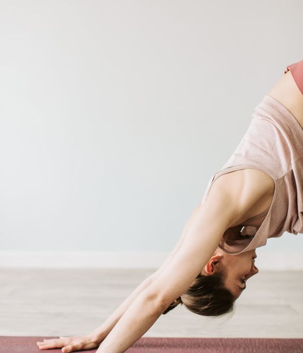 A serene woman in a calm yoga pose, embodying inner peace and balance.